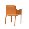 Orange saddle leather Cab dining chairs